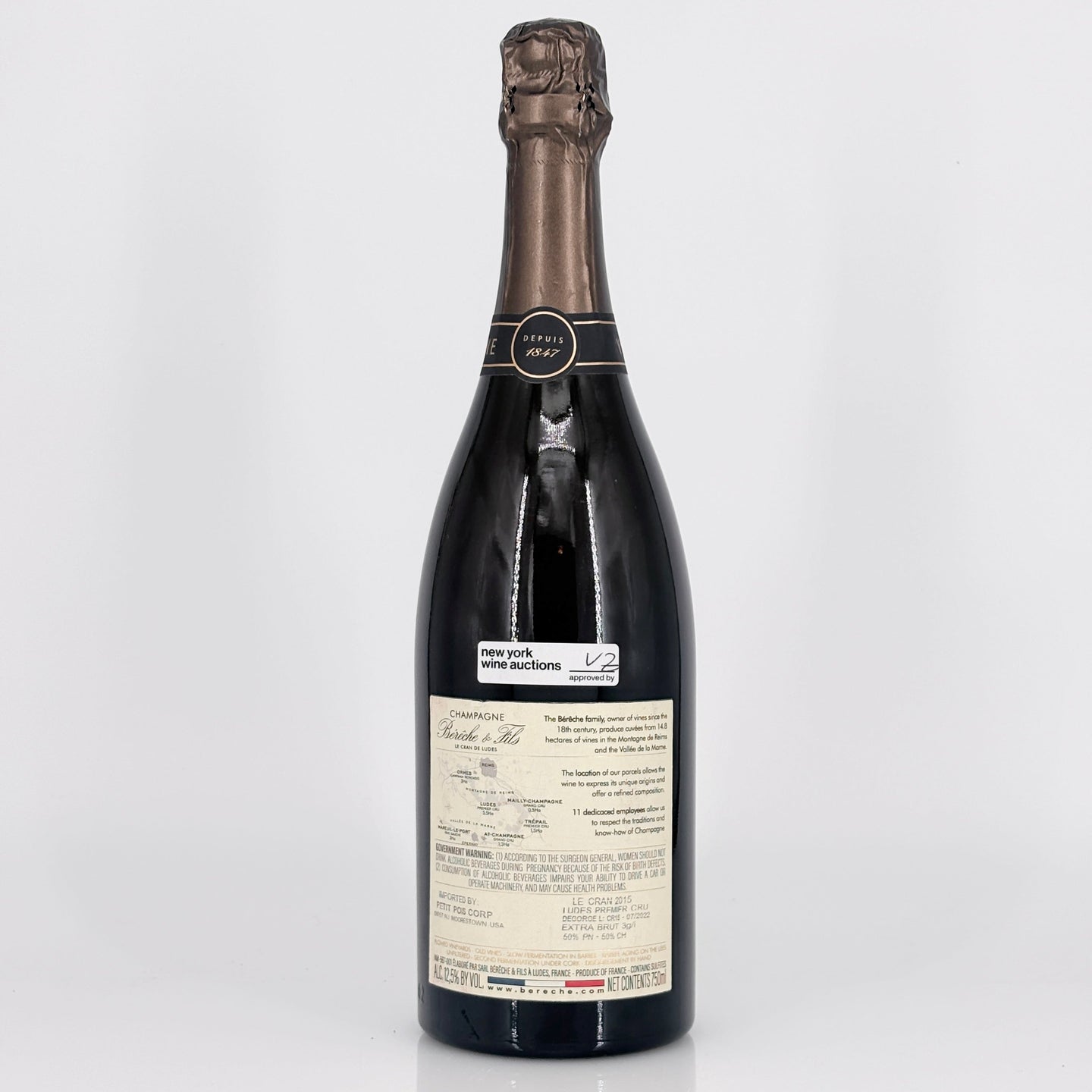 Bottle of wine with a visible label on a white background