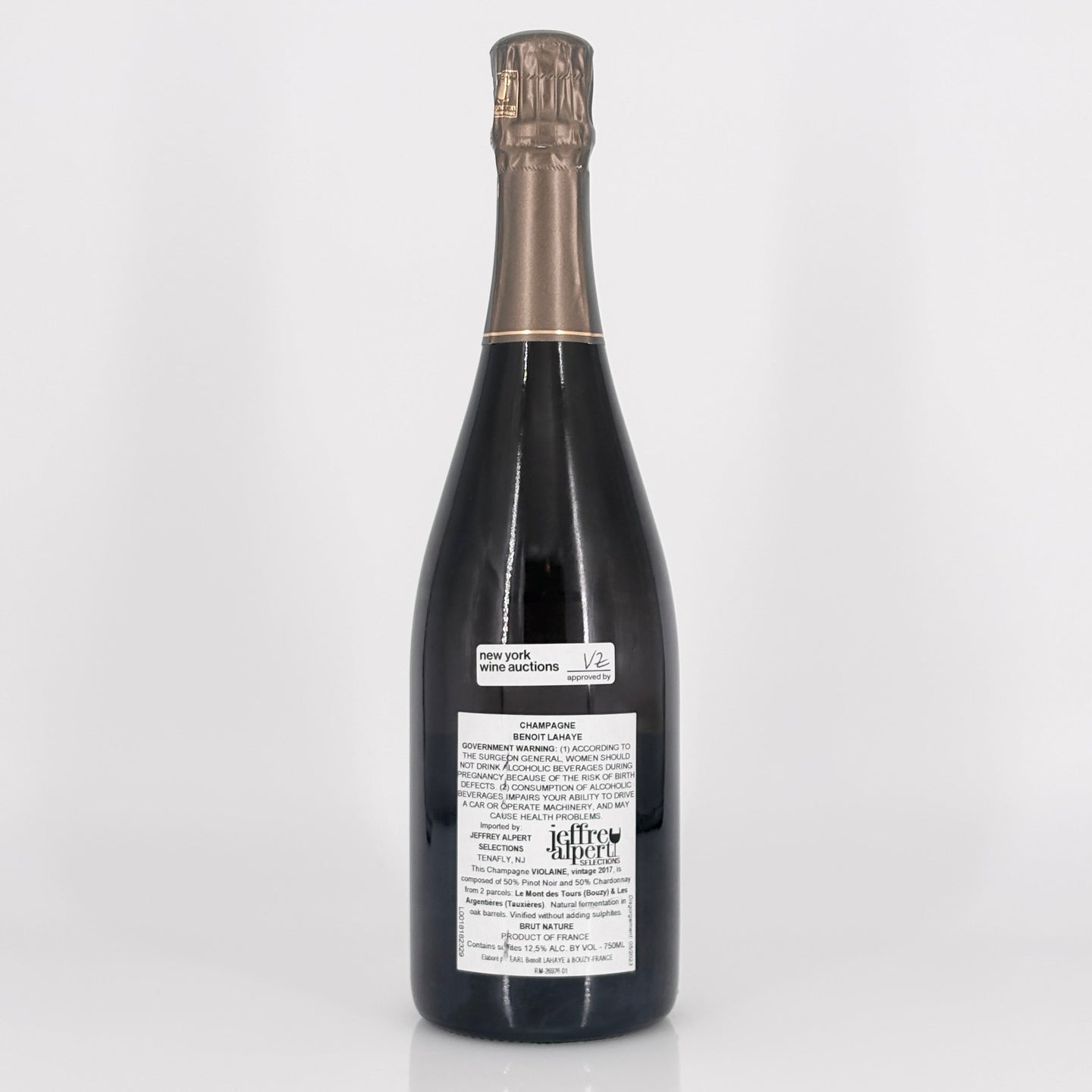 Bottle of wine with a visible label on a white background