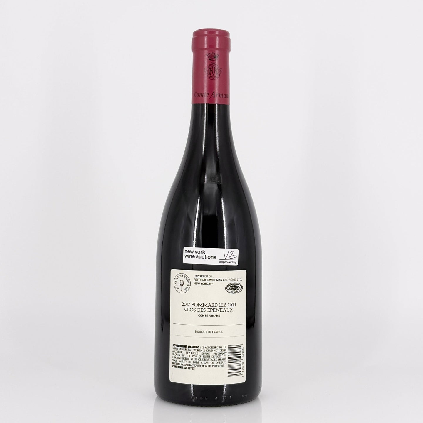 Red wine bottle with a visible label on a white background