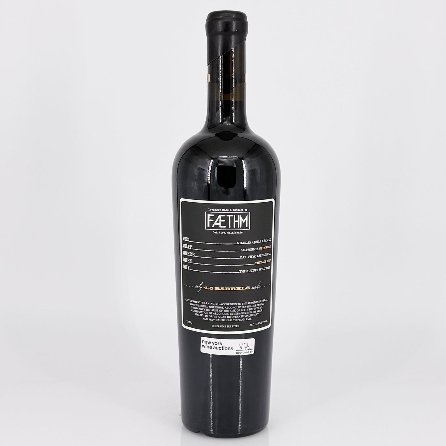 Wine bottle with a black label on a white background