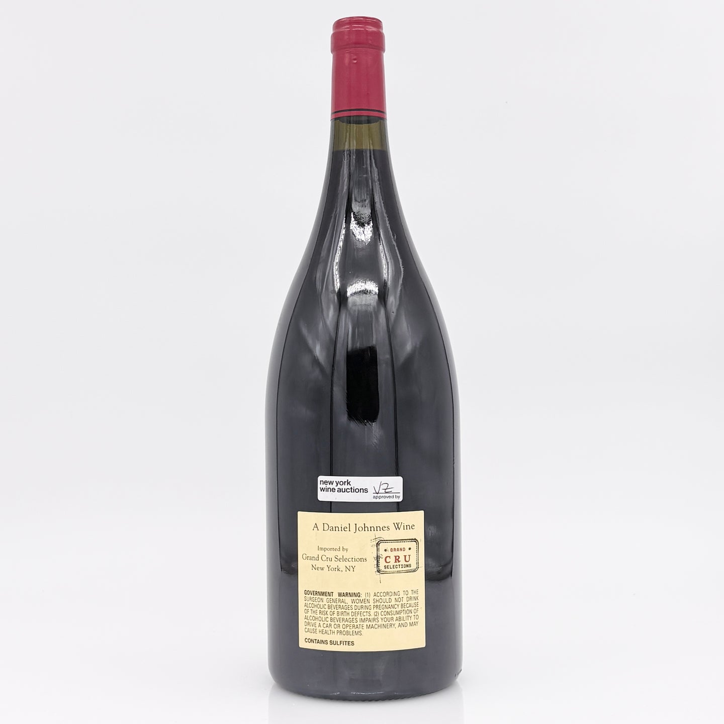 Large wine bottle with a visible label on a white background