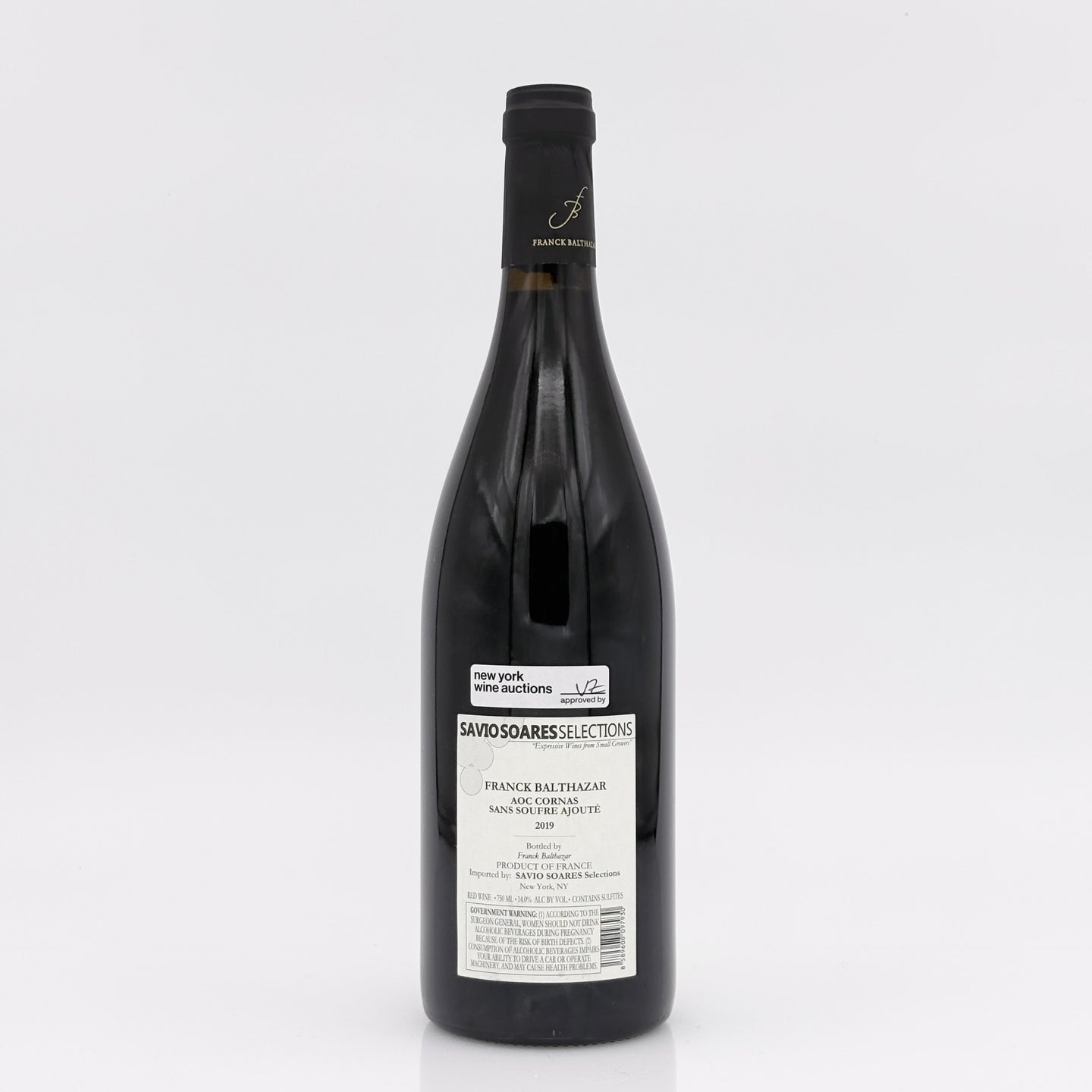 Wine bottle with a label on a white background