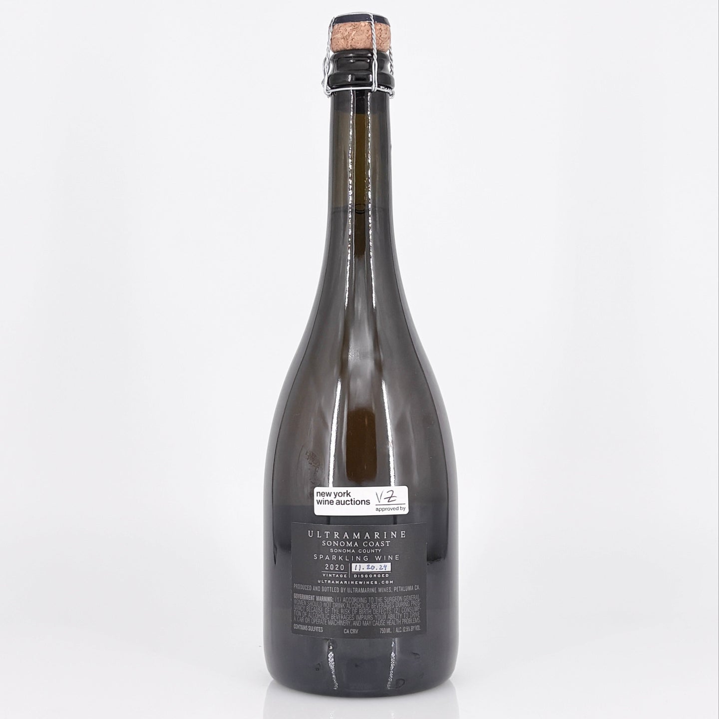 Bottle of Ulteramare with cork on a white background