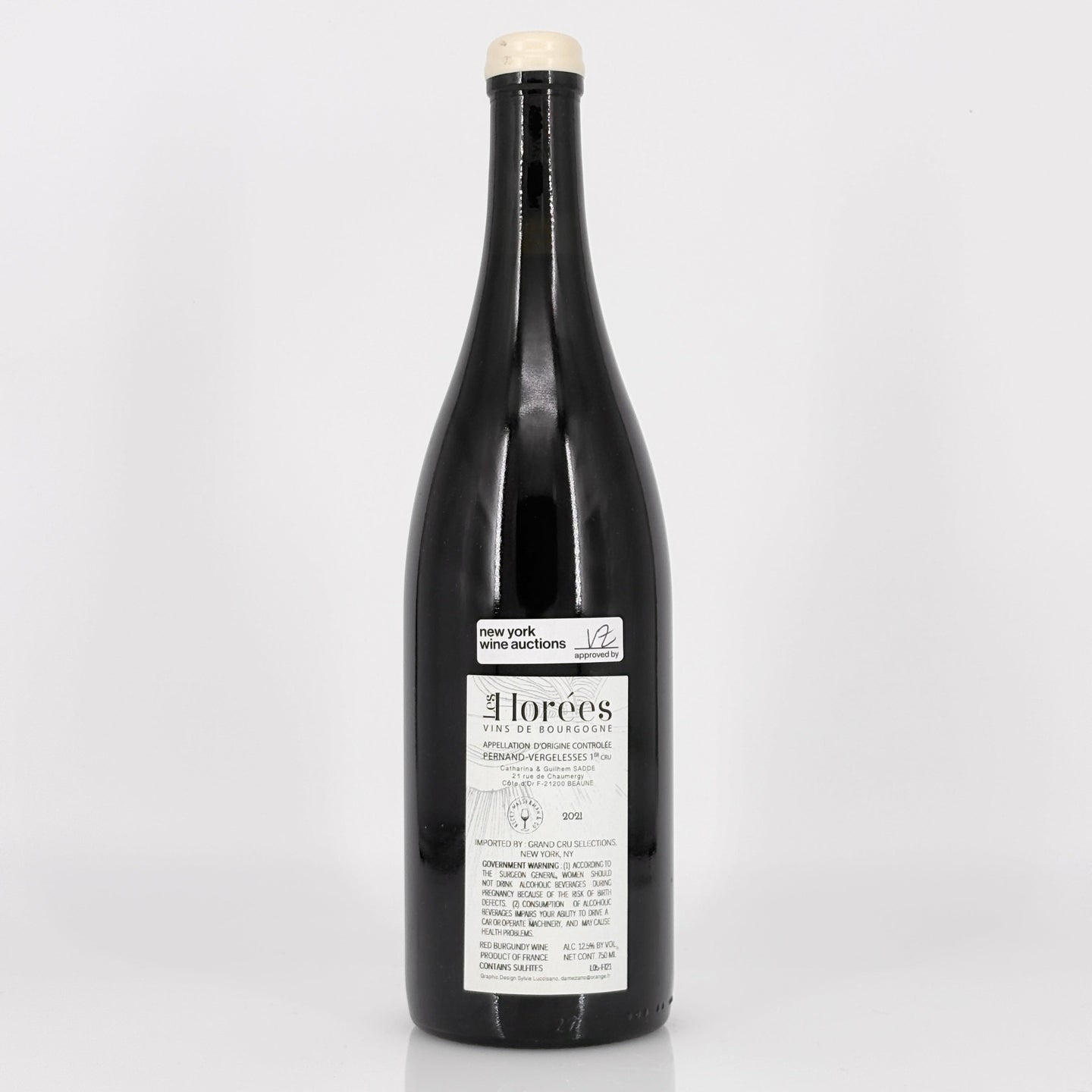 Wine bottle with a label on a white background