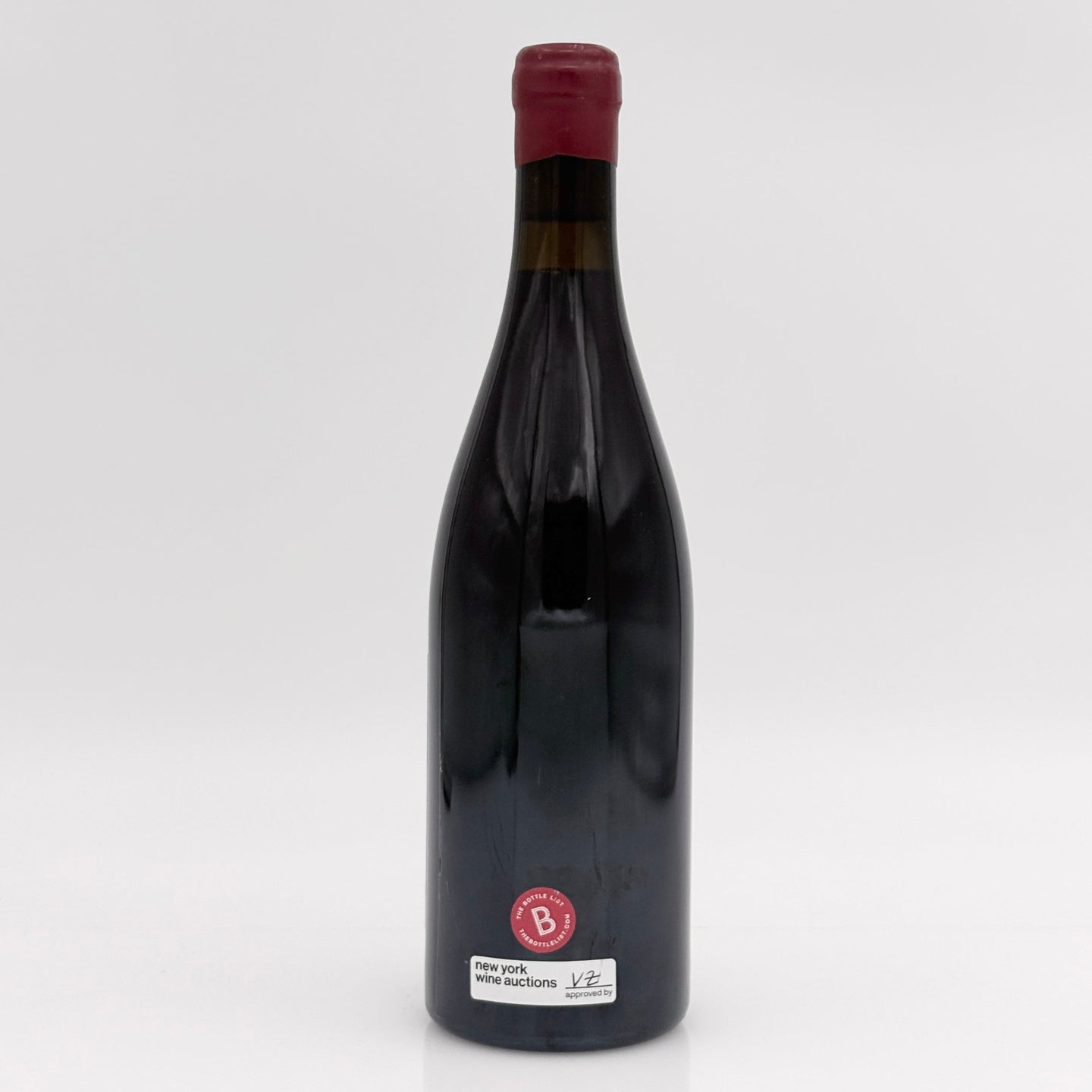 Wine bottle with a visible label on a white background