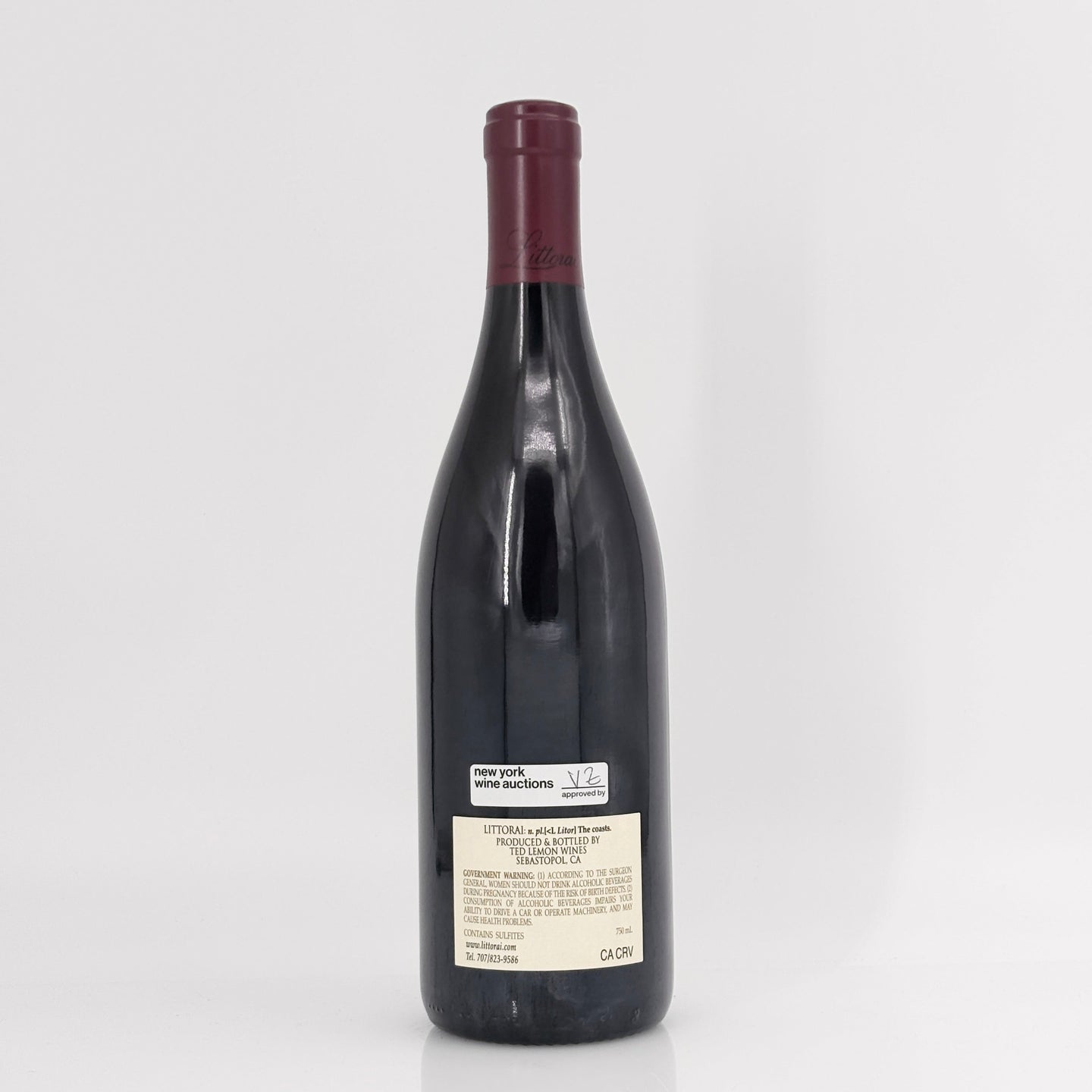Wine bottle with a visible label on a white background