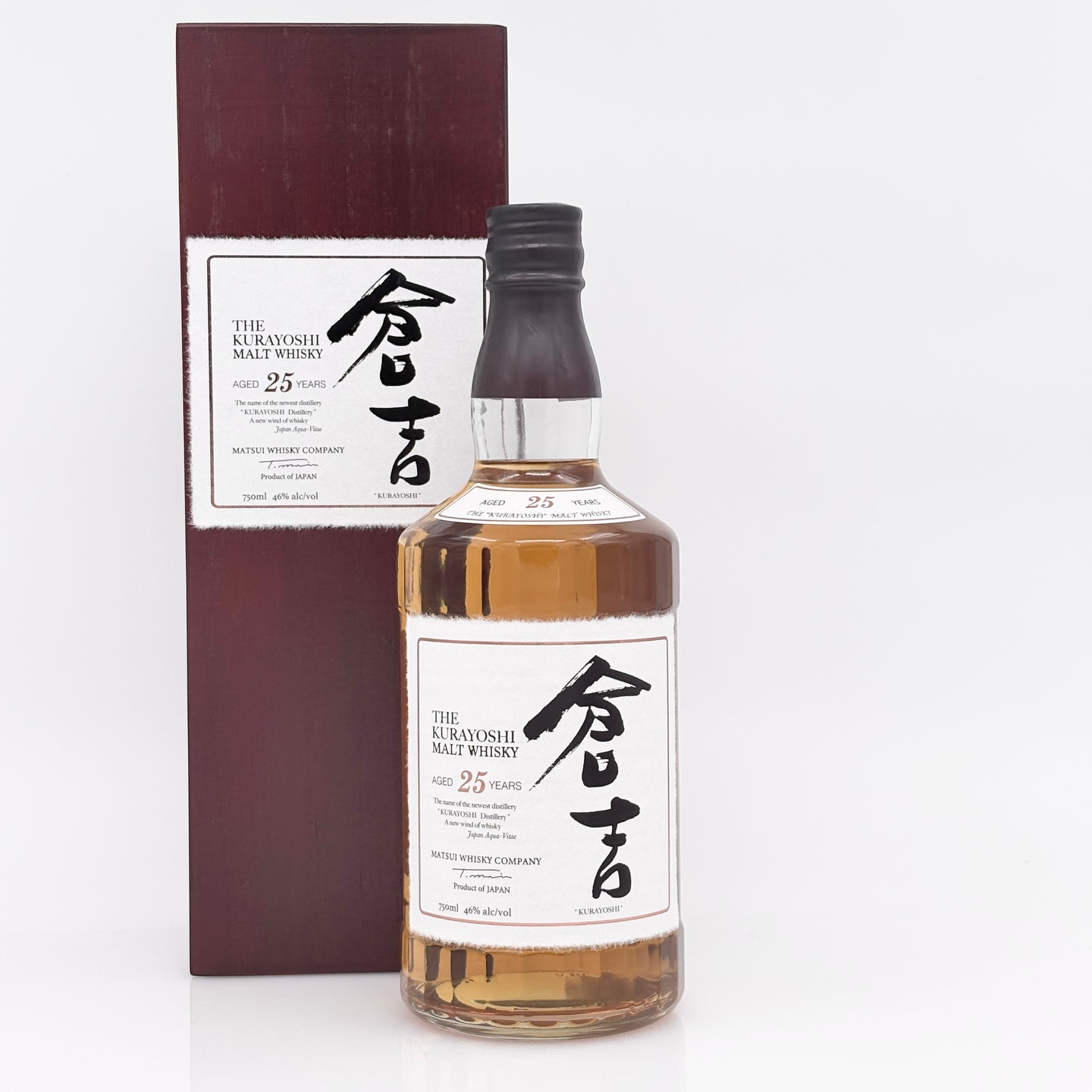 Bottle of whisky with a box on a white background
