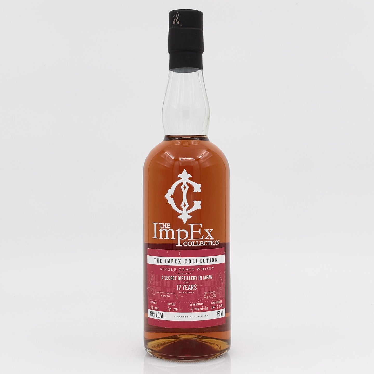 Bottle of ImpEx Collection whiskey on a white background
