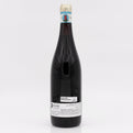 Wine bottle with a visible label on a white background