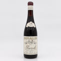 Red wine bottle with white label on a white background