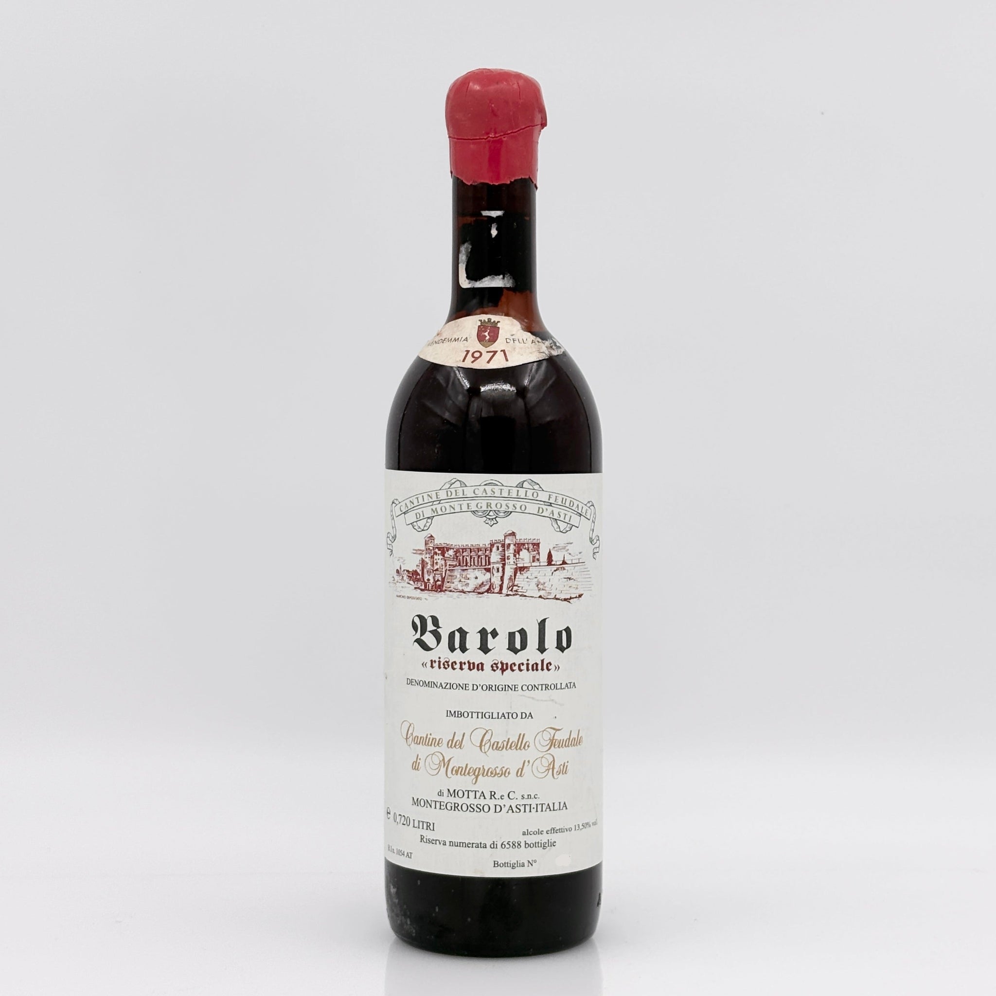 Barolo wine bottle with a white label on a light gray background
