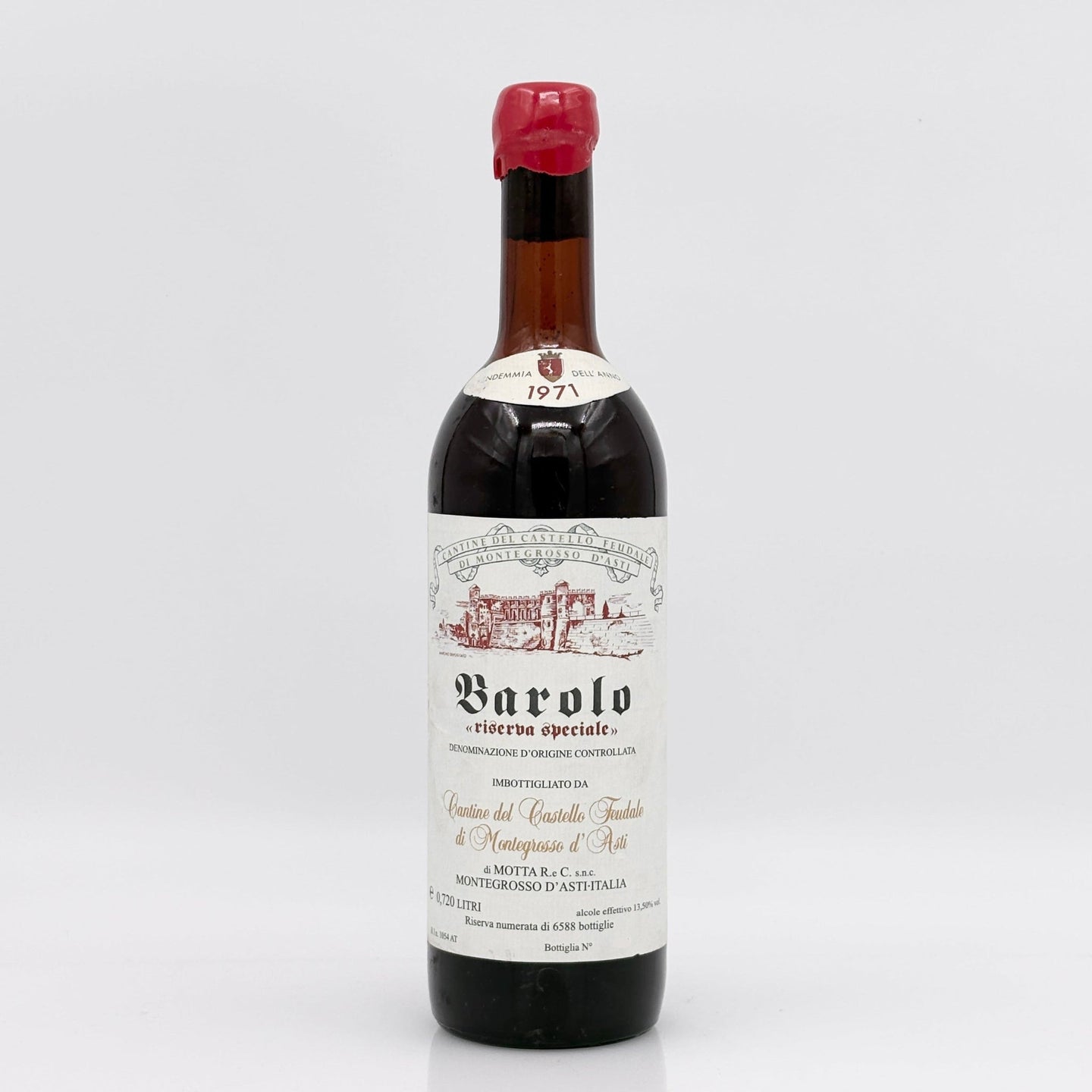 Vintage Barolo wine bottle with a white label on a light gray background