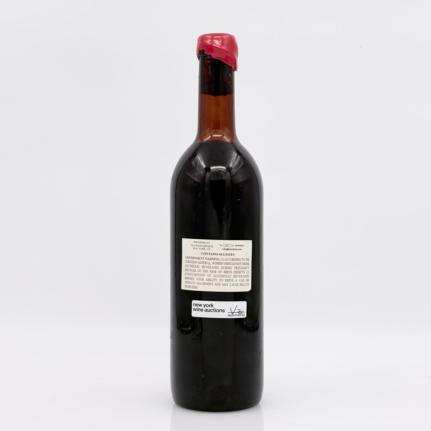 Wine bottle with a label on a white background