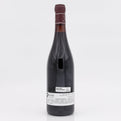 Wine bottle with a label on a white background