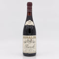 Vintage wine bottle with a label on a white background