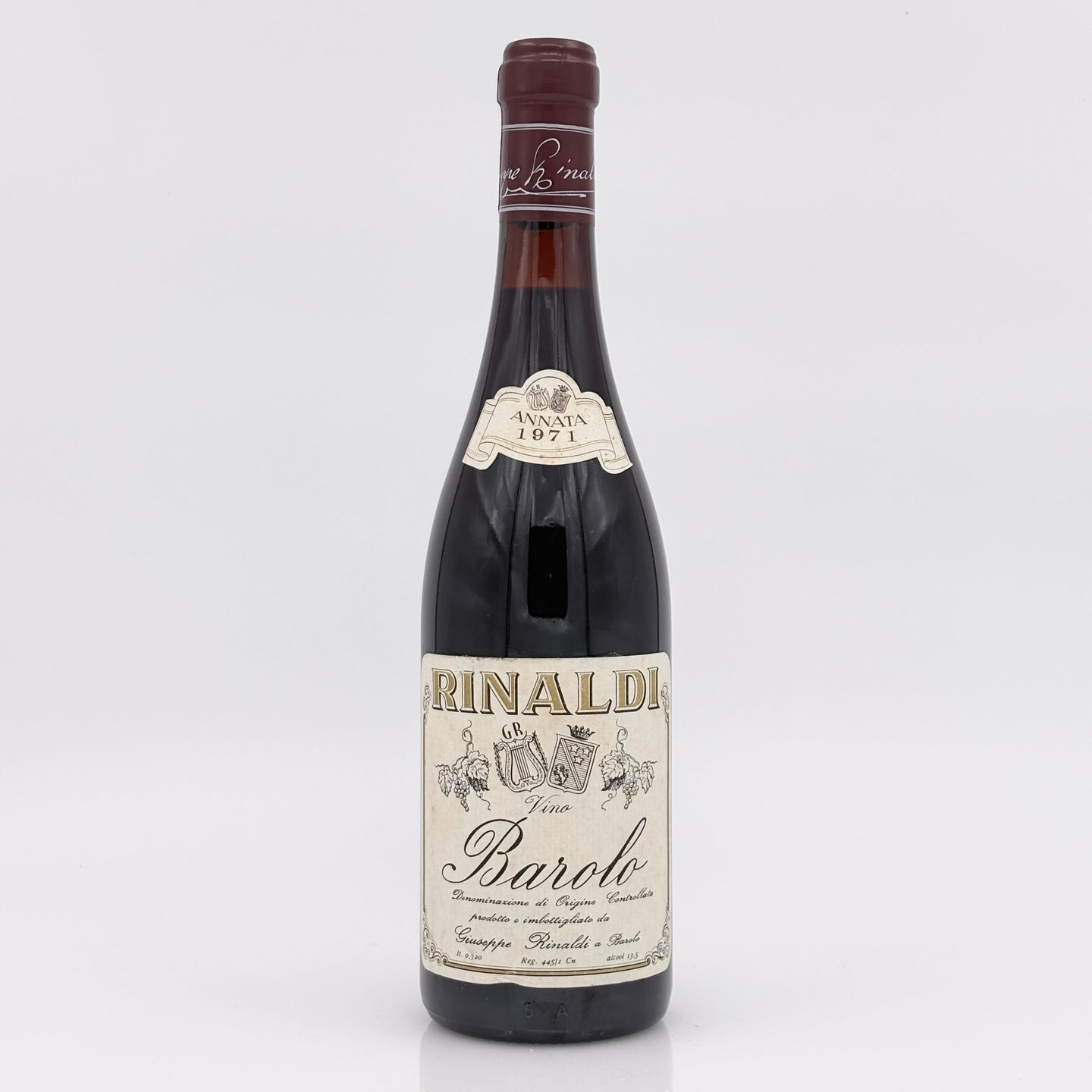Vintage wine bottle with a label on a white background