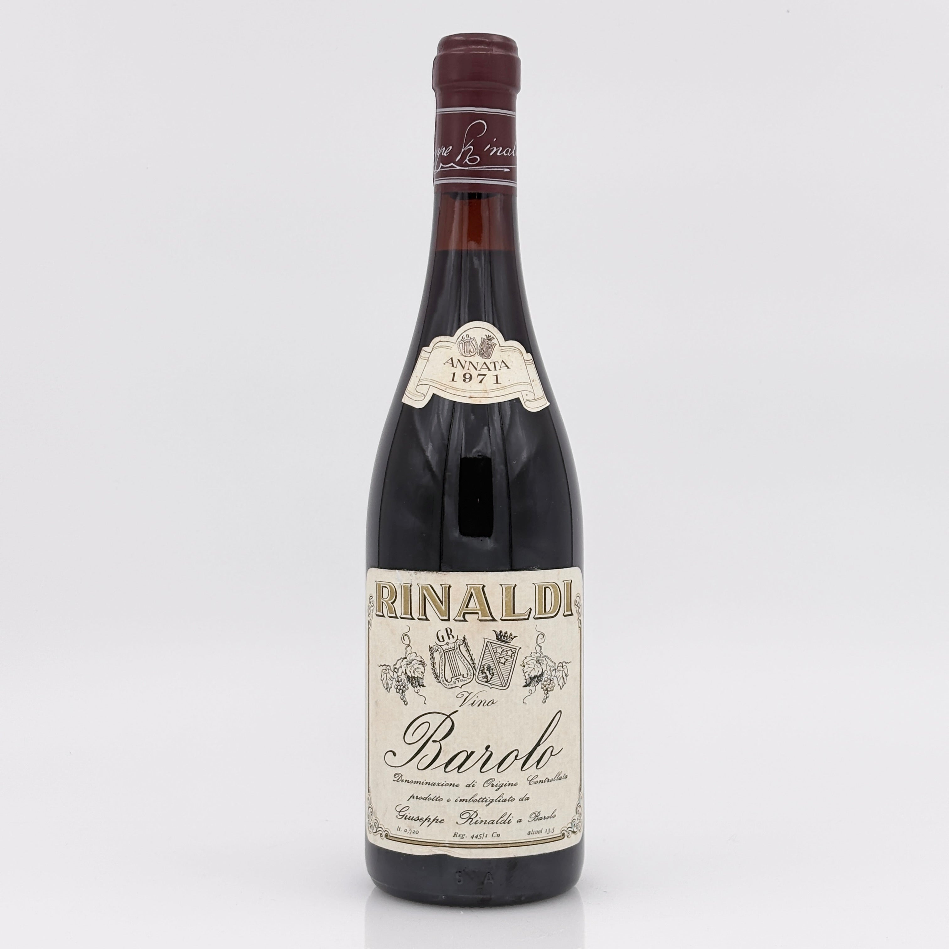Vintage wine bottle with a label on a white background