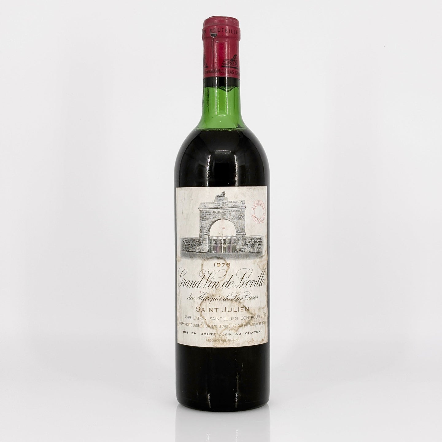Bottle of wine with a label on a white background