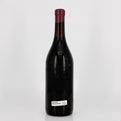 Wine bottle with a visible label on a white background
