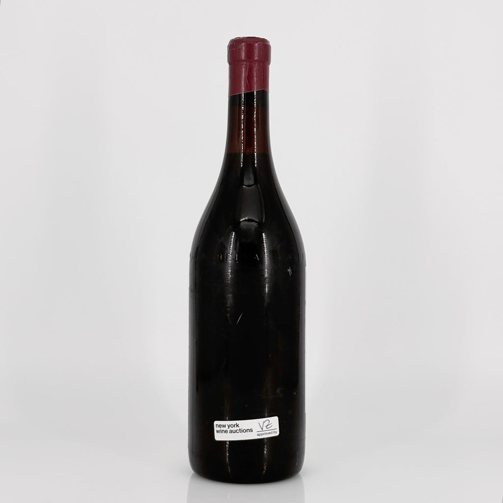 Wine bottle with a visible label on a white background