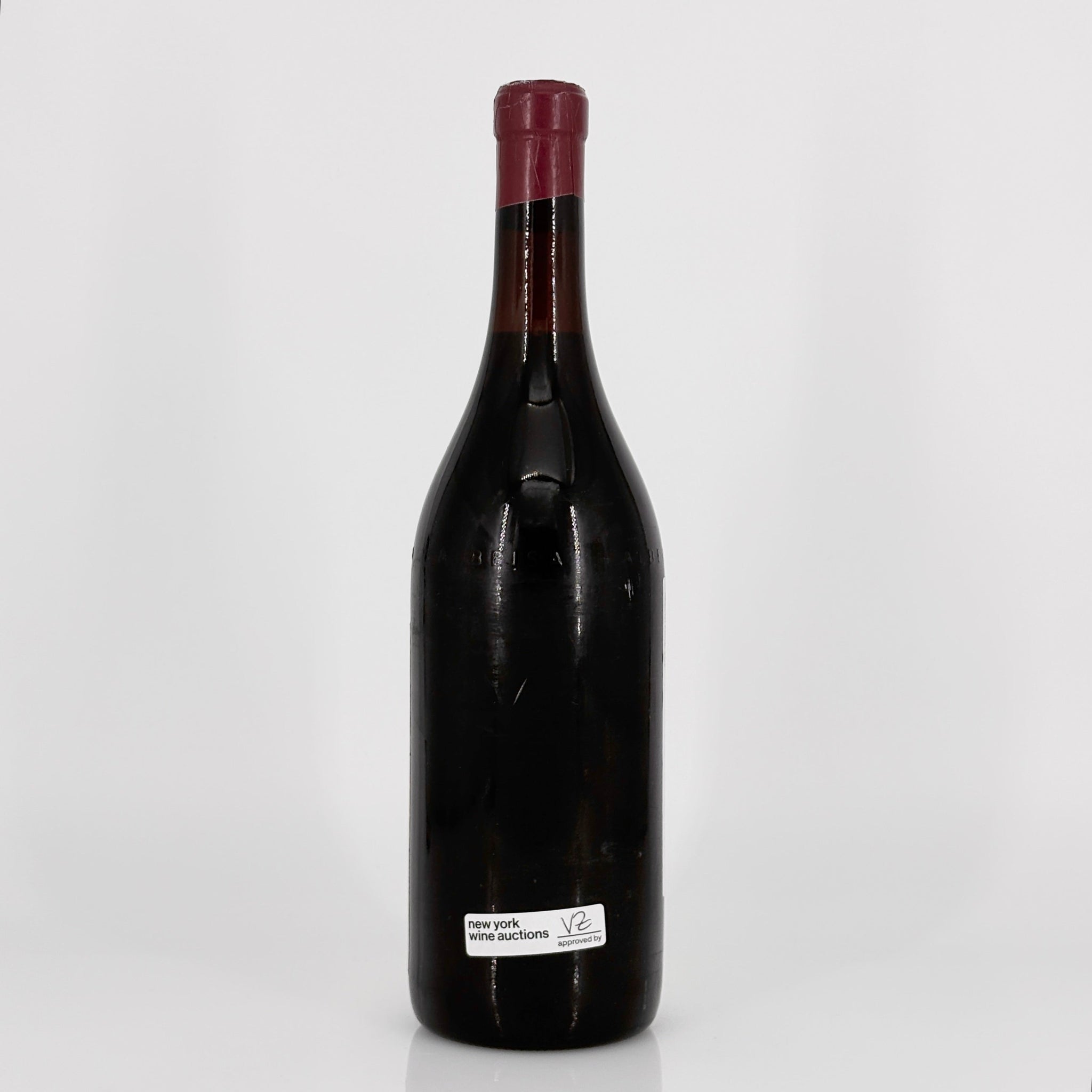 Wine bottle with a visible label on a white background