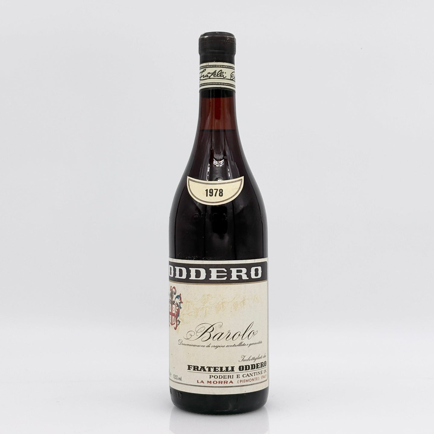 Bottle of Oddero Barolo wine from 1978 on a white background