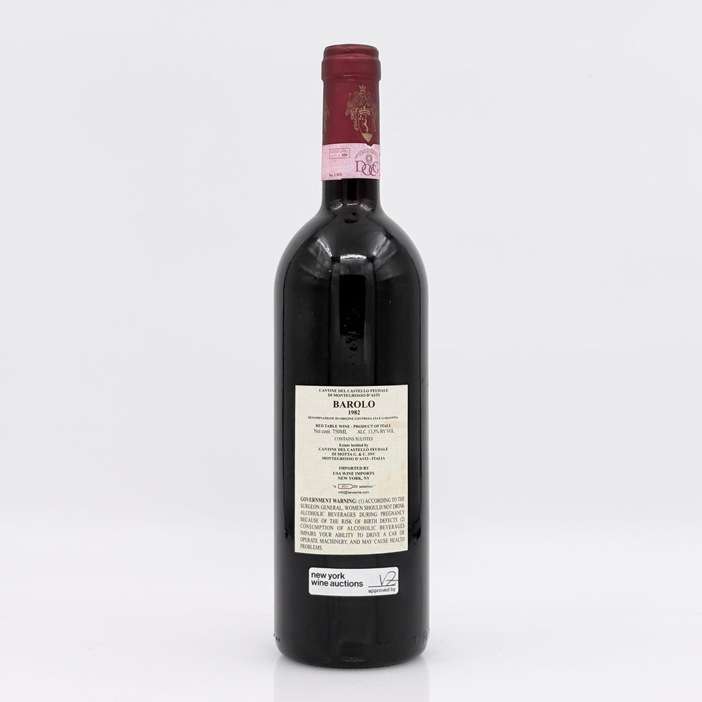 Red wine bottle with a visible label on a white background