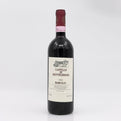 Red wine bottle with a visible label on a white background