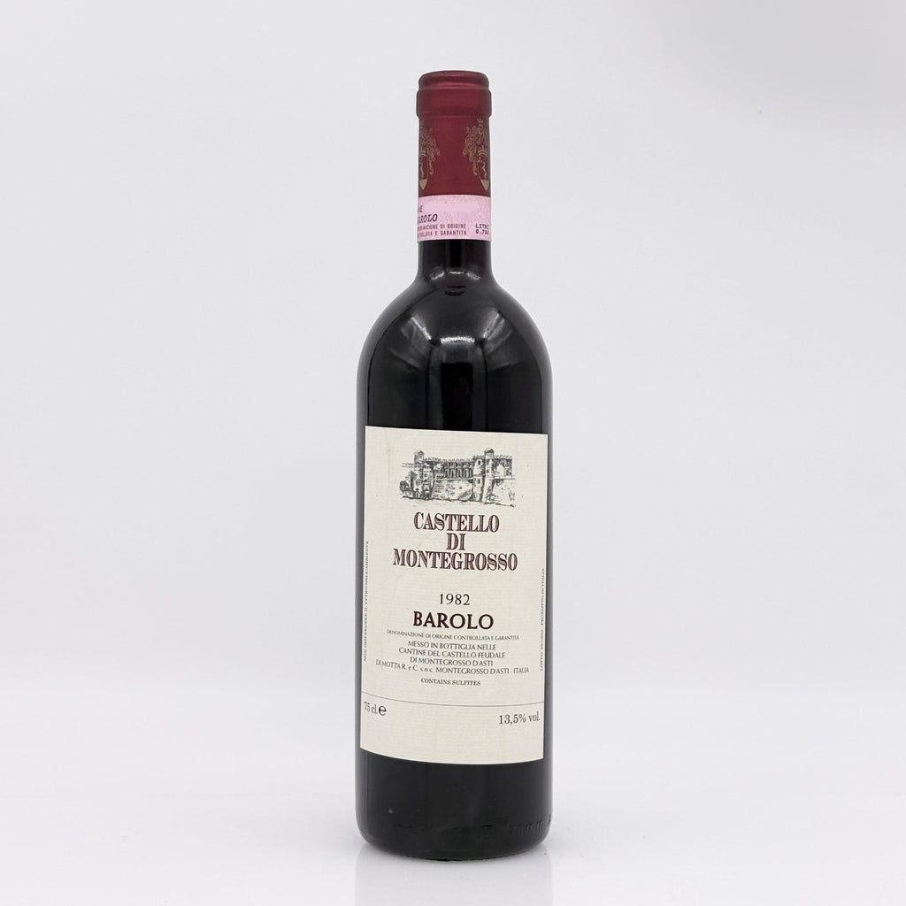 Red wine bottle with a visible label on a white background