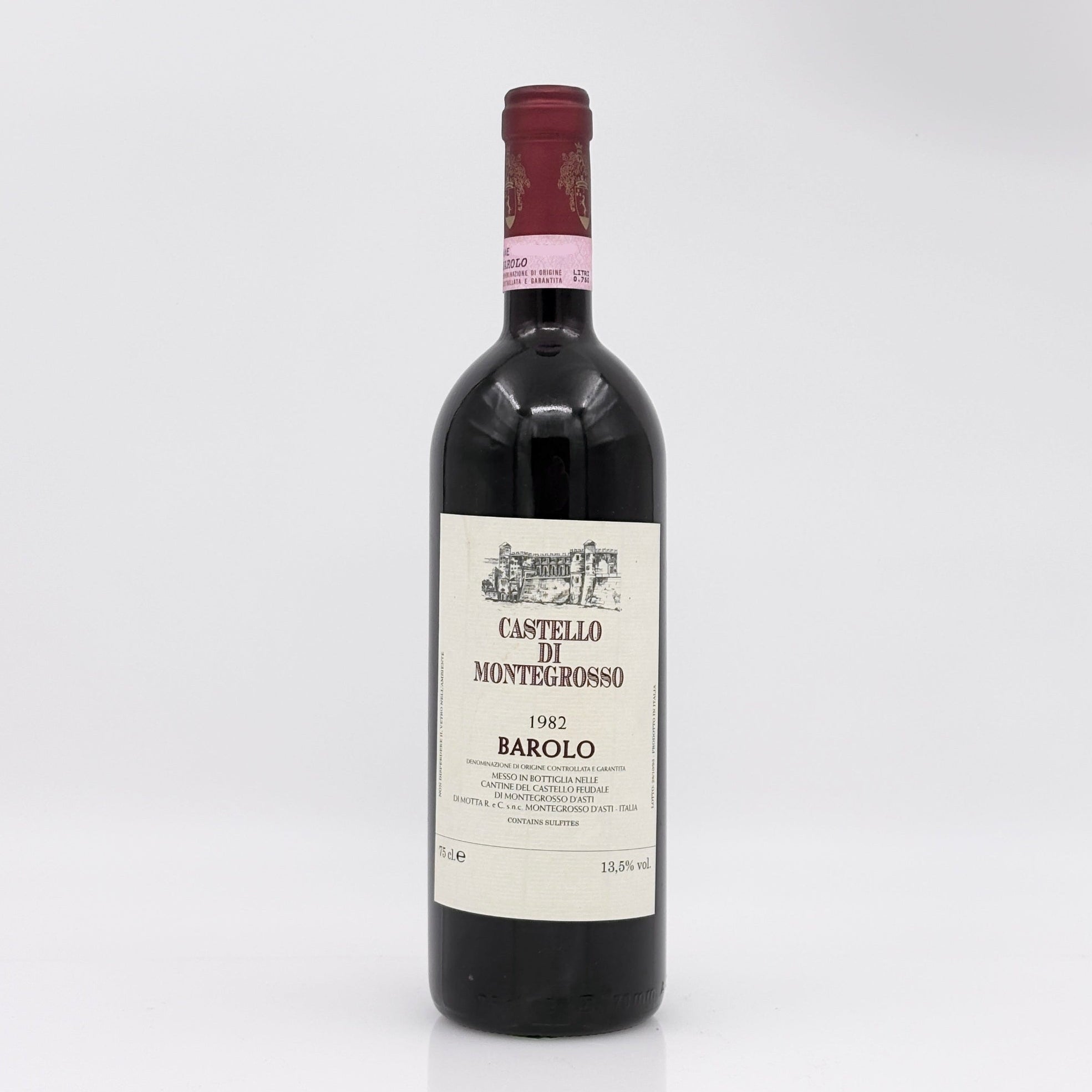 Red wine bottle with a visible label on a white background