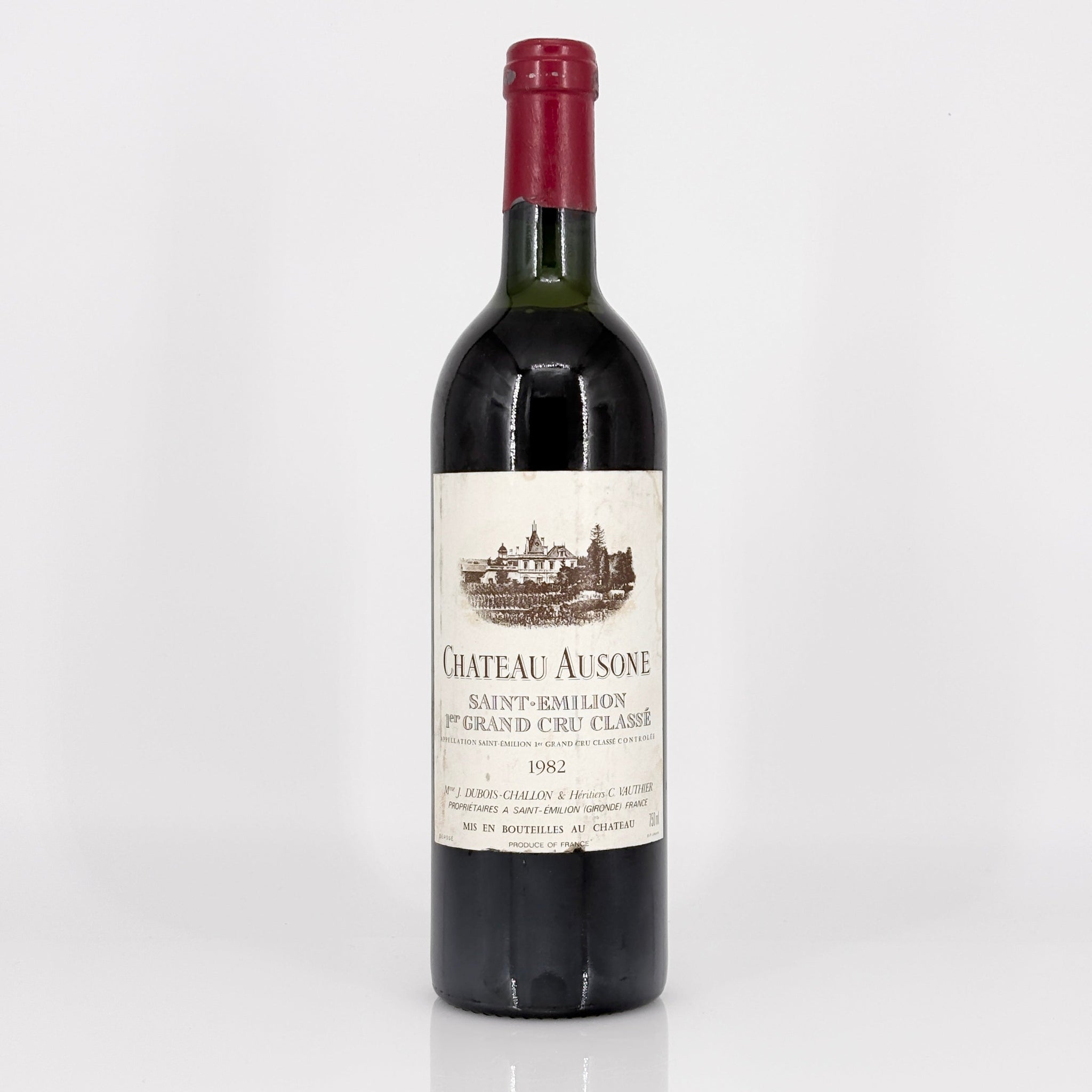 Bottle of Chateau Ausone wine on a white background