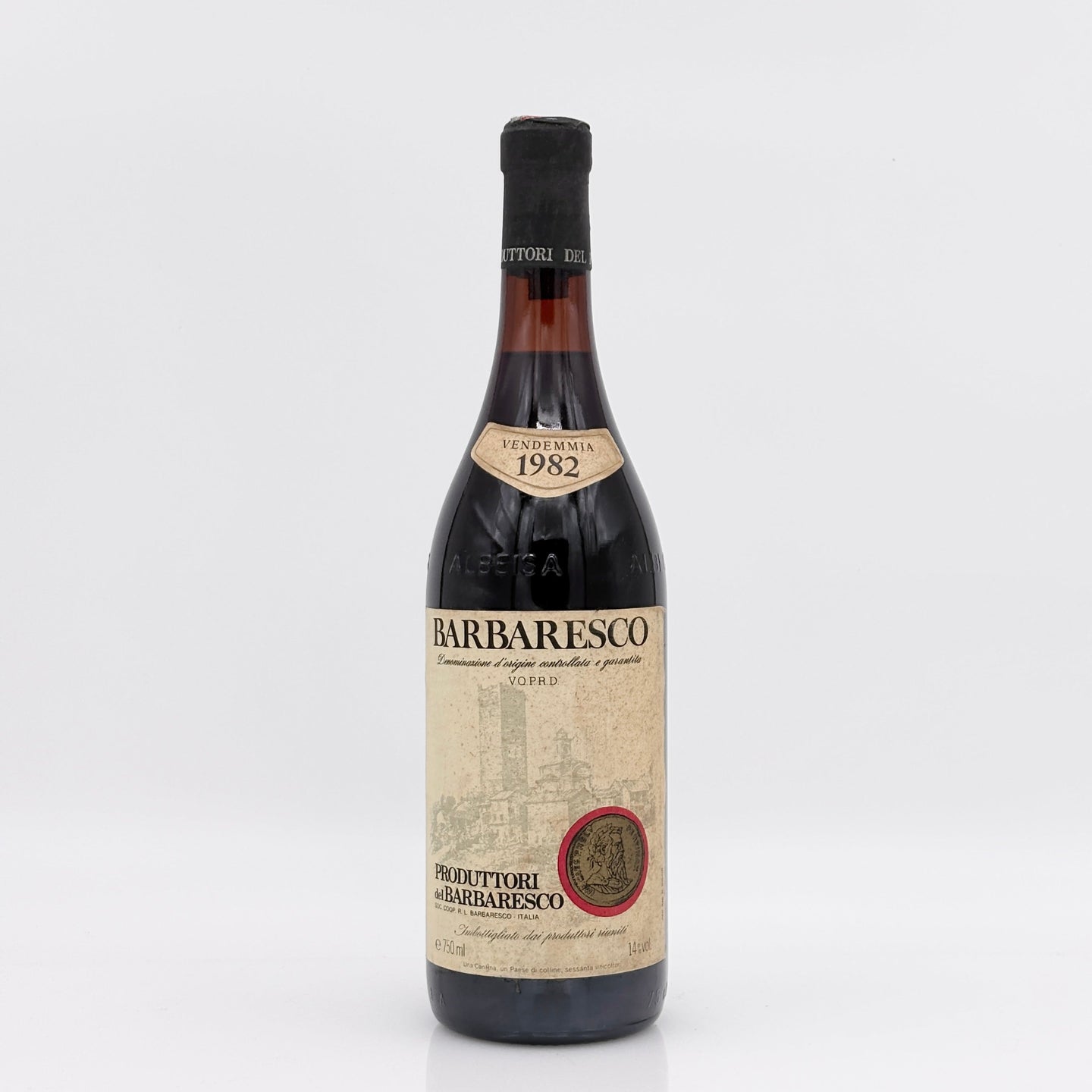 Barbaresco wine bottle from 1982 on a white background