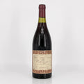 Wine bottle with decorative label on a white background