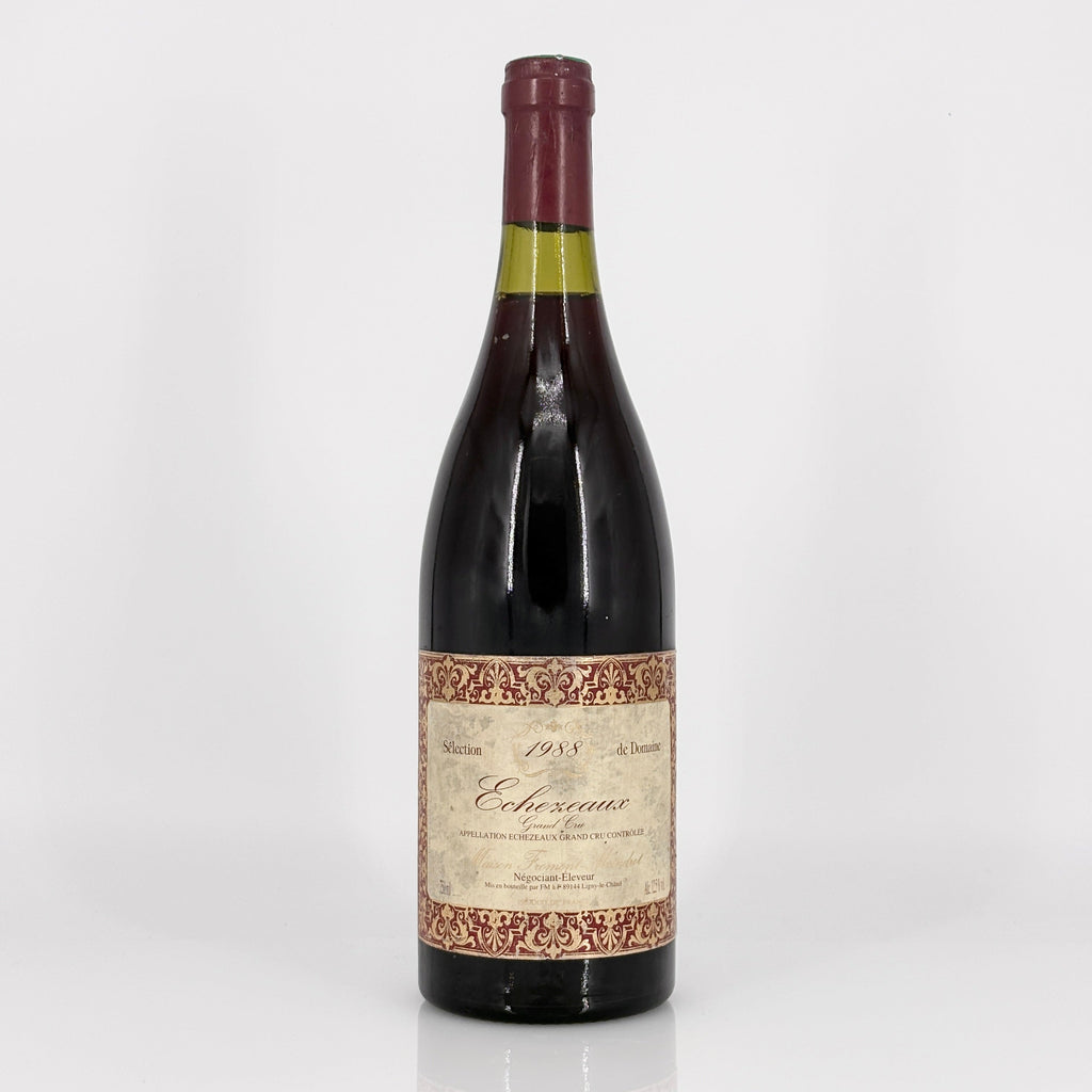 Wine bottle with decorative label on a white background