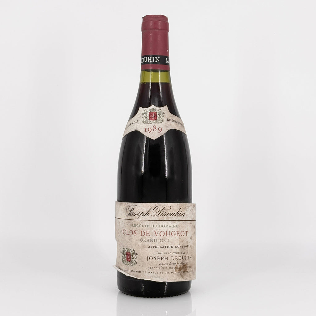 Bottle of 1989 Clos de Vougeot wine by Joseph Drouhin on a white background