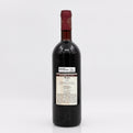 Wine bottle with a label on a white background