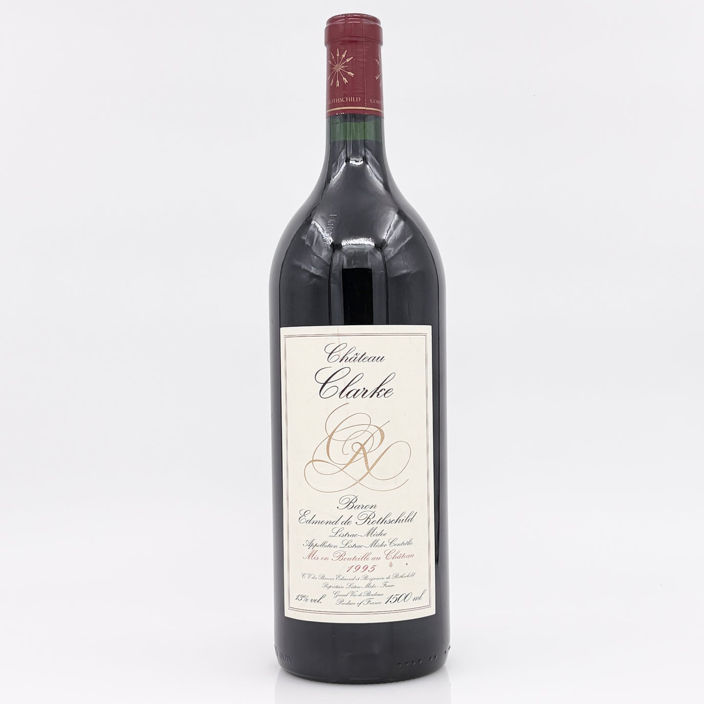Bottle of Château Clarke wine on a white background