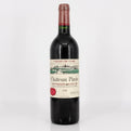 Bottle of Château Pavie red wine on a white background