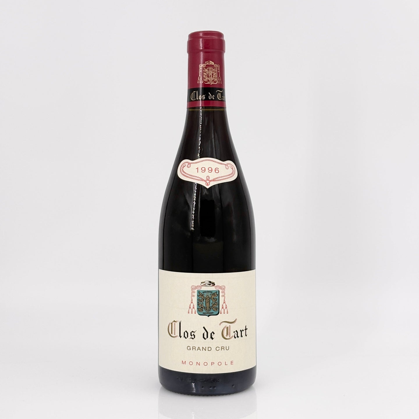 Bottle of Clos de Tart Grand Cru Monopole wine on a white background