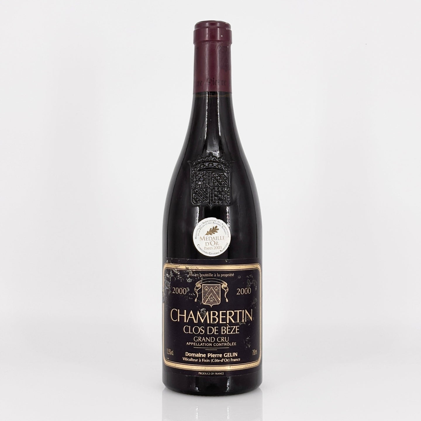 Wine bottle with a detailed label on a white background