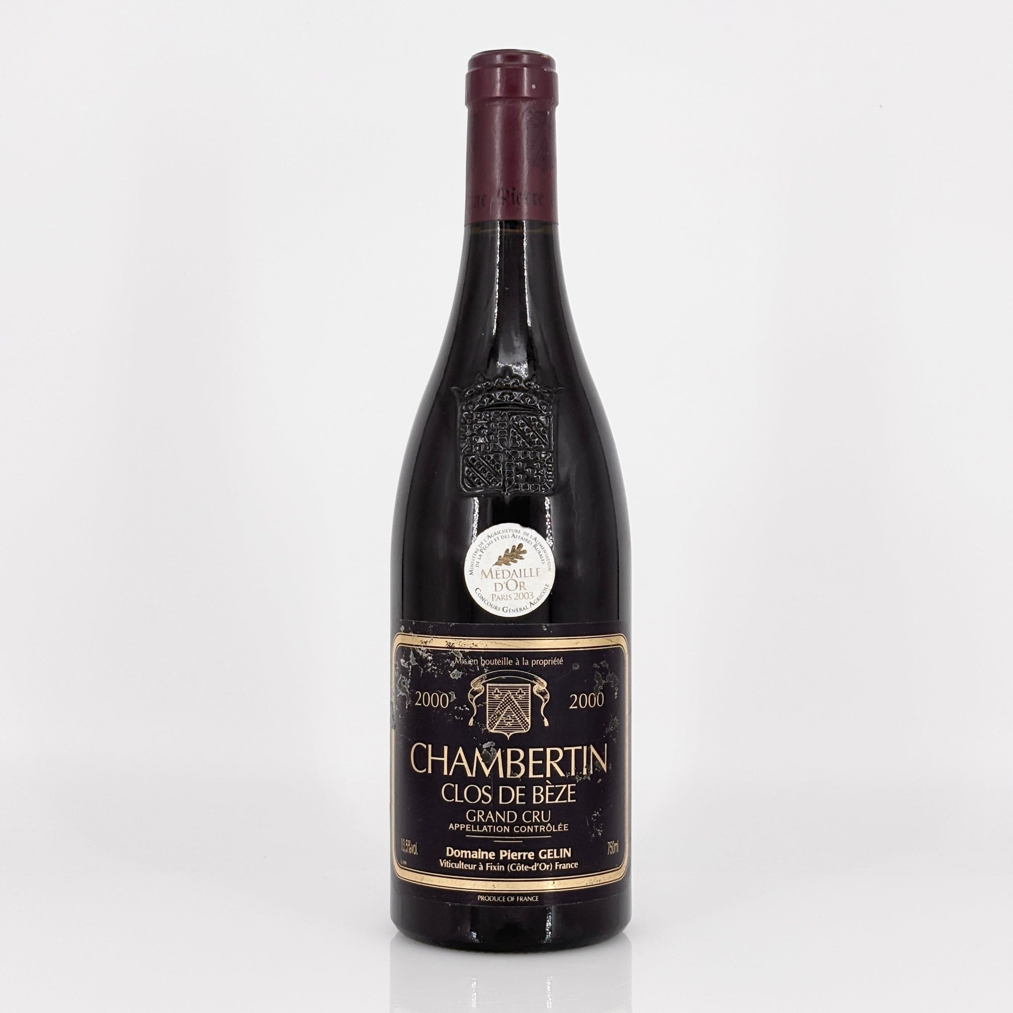 Wine bottle with a detailed label on a white background