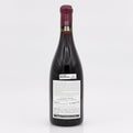 Wine bottle with a label on a white background