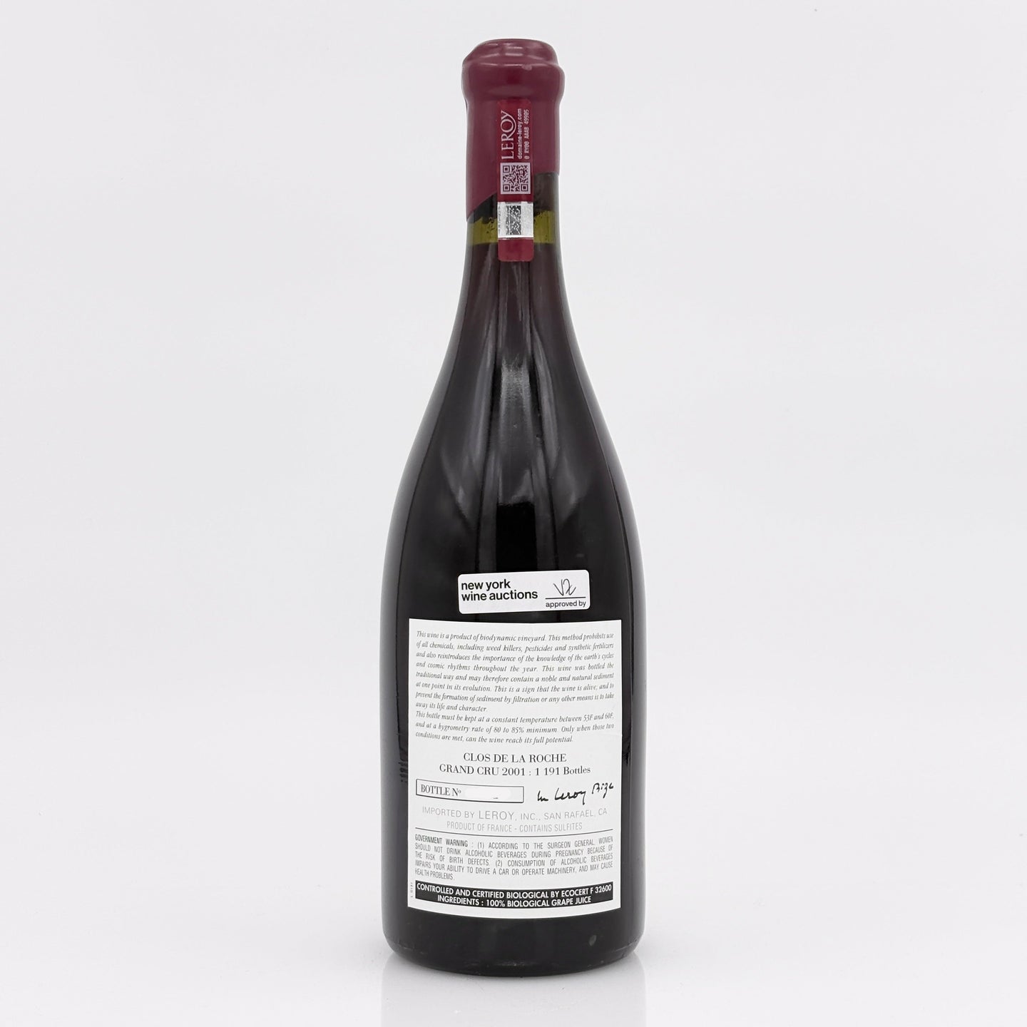 Wine bottle with a label on a white background