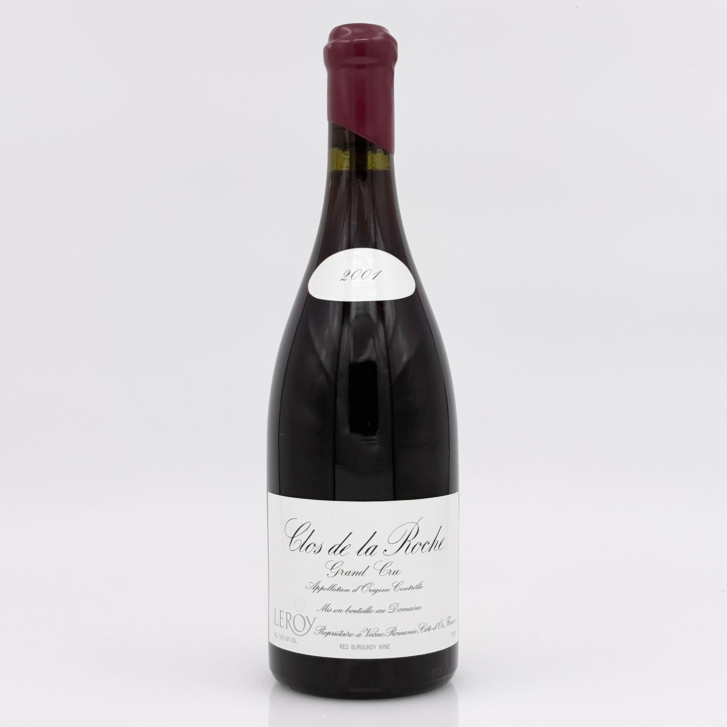 Wine bottle labeled 'Clos de la Roche' on a white background