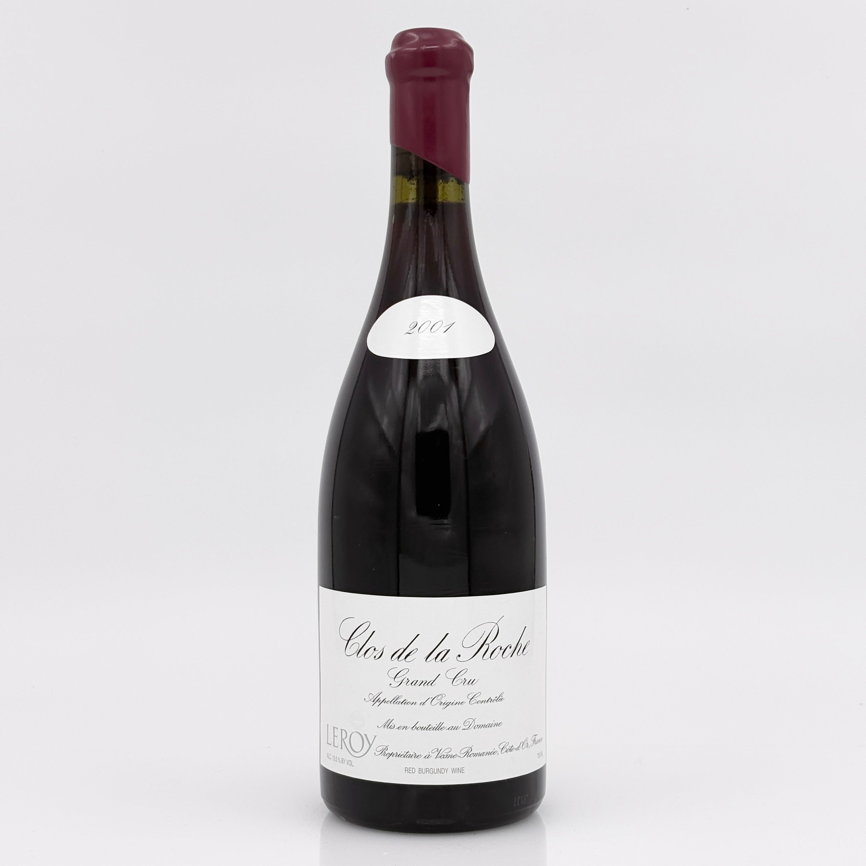 Wine bottle labeled 'Clos de la Roche' on a white background