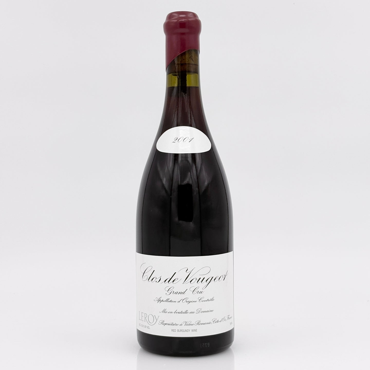 Wine bottle with a white label on a light gray background