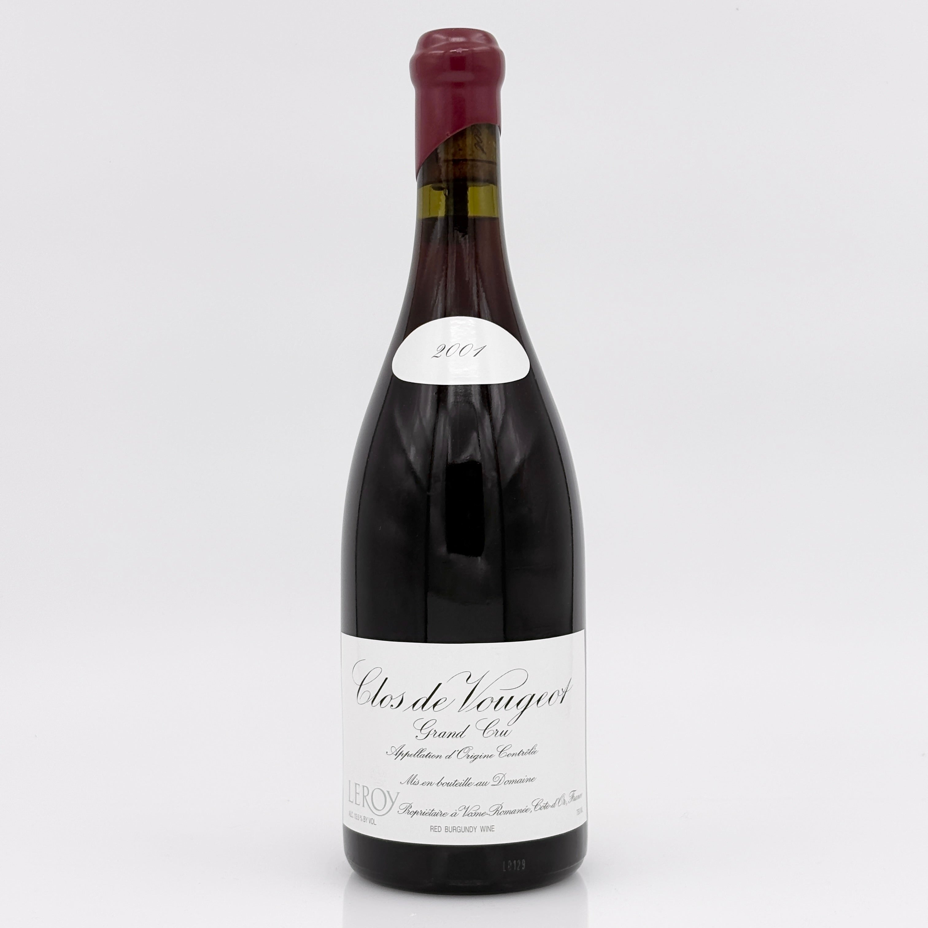 Wine bottle with a white label on a light gray background
