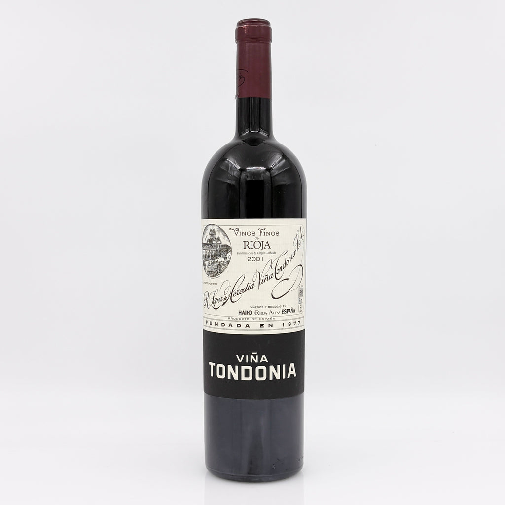Red wine bottle with 'Vina Tondonia' label on a white background