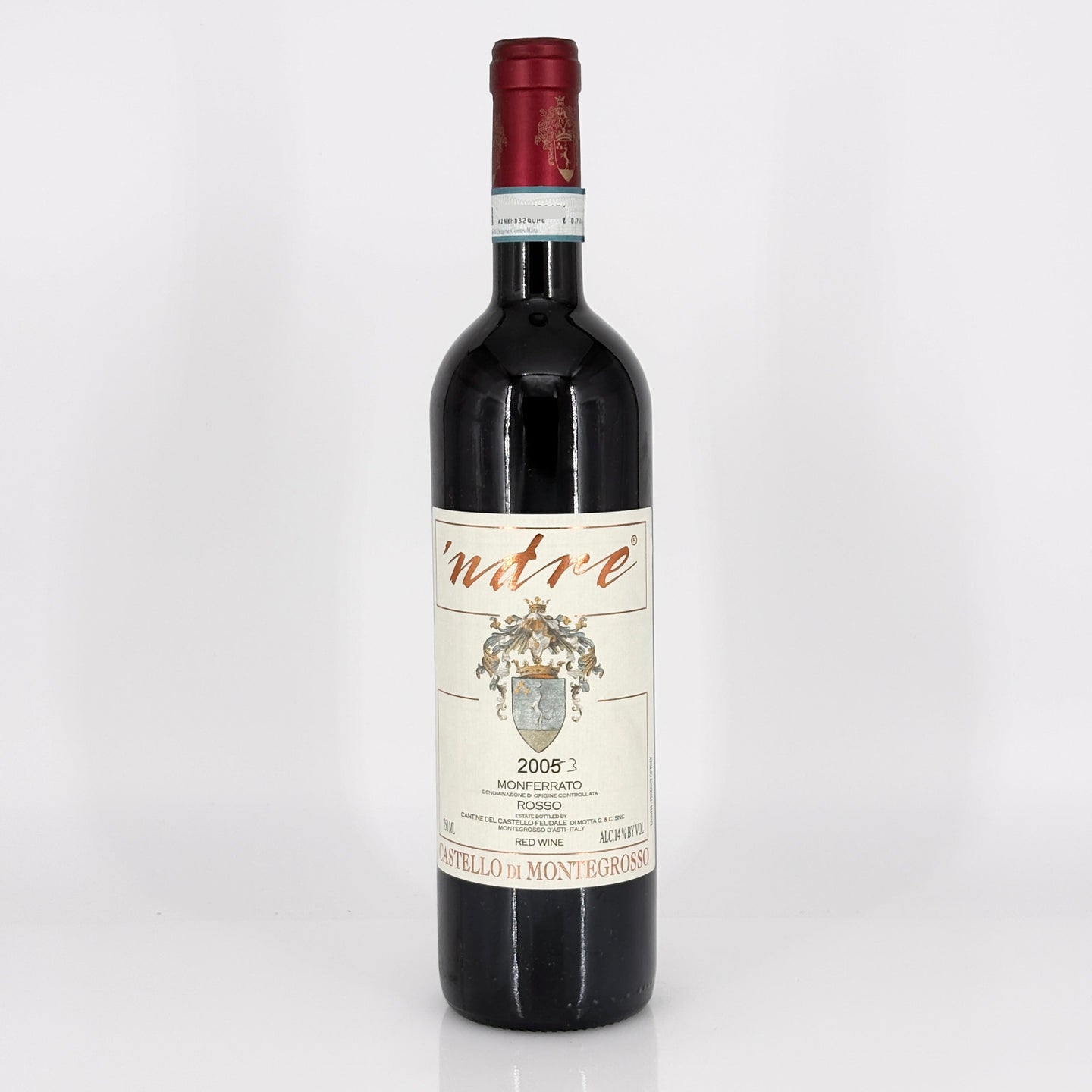 Red wine bottle with a visible label on a white background