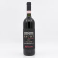 Red wine bottle with 'Radici' label on a white background